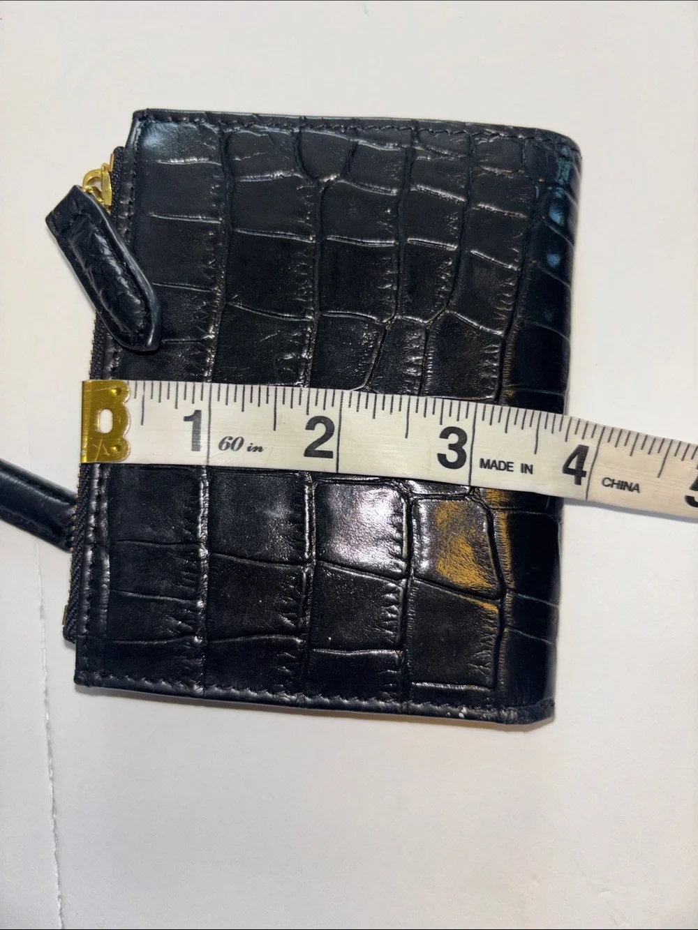 KURT GEIGER BLACK EMBOSSED LEATHER WALLET SNAP CLOSURE 2 GOLD TONED ZIP POCKETS